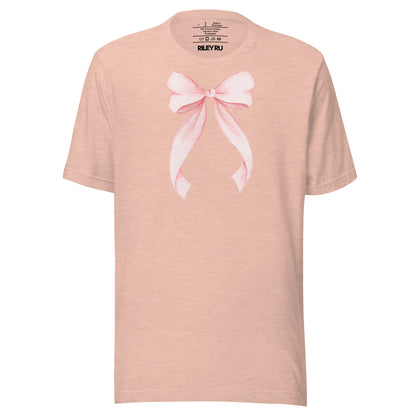 Pink t-shirt with a white bow design on a white background
