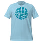 Light blue t-shirt with 'Good Vibes' text on a white background