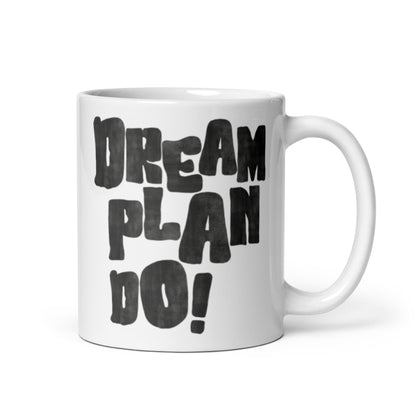 White mug with black text 'Dream Plan Do!' on a white background